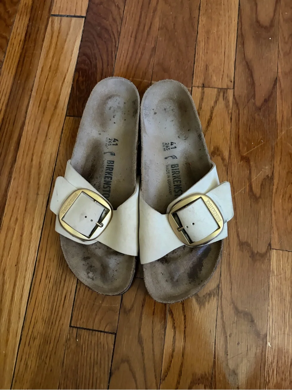 Birkenstock Ivory Slide Sandals with Gold Buckles